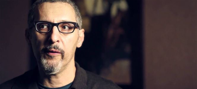 Фильм «Трансформеры: Последний рыцарь»: актер Джон Туртурро в роли Сеймура Симмонса Фильм «Трансформеры: Последний рыцарь»: актер Джон Туртурро в роли Сеймура Симмонса