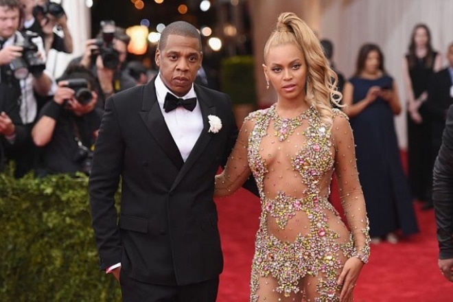 Jay-Z with his wife Jay-Z with his wife