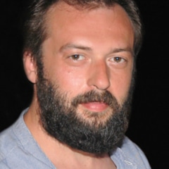 фотография Окан Ялабык