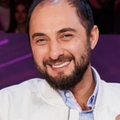 фотография Демис Карибидис