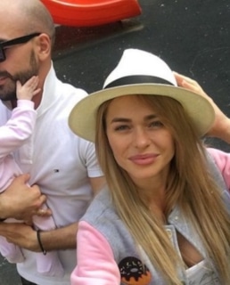 Анна Хилькевич с мужем и дочкой