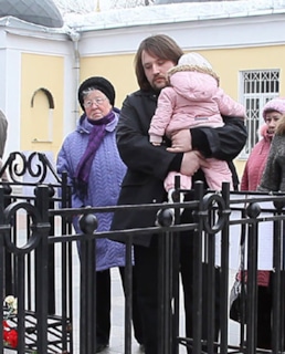 Александр Листьев с дочкой