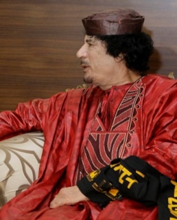 Муаммар Каддафи