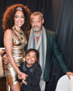 Джина Торрес и Лоуренс Фишборн с дочерью