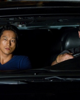 Сон Кан и Сильвестр Сталлоне в фильме «Неудержимый»