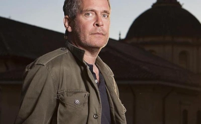 Том Холландер