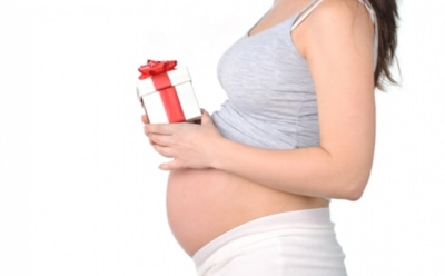 Что подарить беременной женщине на Новый год