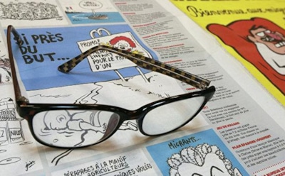 Charlie Hebdo разместил на обложку Меркель с отрезанной головой Шульца в руках