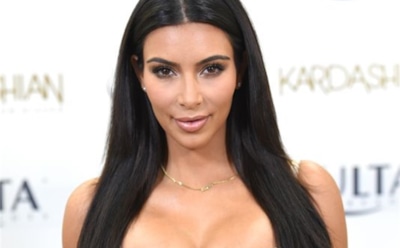 Папарацци запечатлели идеальную фигуру Ким Кардашьян на пляже