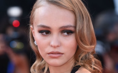 Папарацци запечатлели располневшую дочь Джонни Деппа