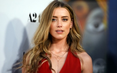 Папарацци засняли Илона Маска вместе с Эмбер Херд