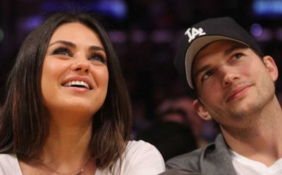 Мила Кунис и Эштон Катчер поцеловались на хоккейном матче