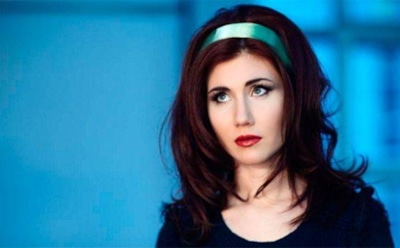 Британские СМИ осудили Анну Чапман за фото в бикини