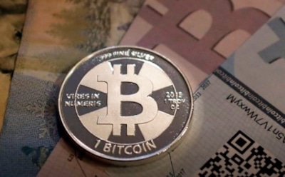 Курс биткоина к доллару падает после двухдневного роста