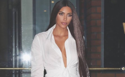 Обнаженная Ким Кардашьян измазалась краской и показала пышные формы