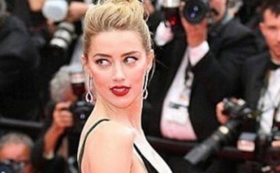 32-летняя Эмбер Херд показала пышные ягодицы в белом купальнике