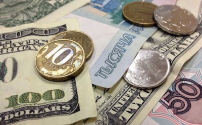 Курс доллара и евро к рублю снизился после слухов о санкциях против России