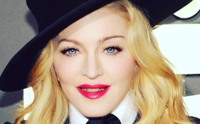 Мадонну обругали за фото ее темнокожих дочерей с арбузом