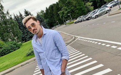 Билан появился на «Новой волне» с нарисованным горящим лесом на торсе