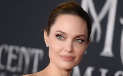 Анджелина Джоли в смелом образе попала на обложку глянца