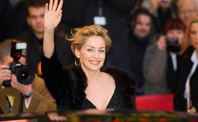 Шэрон Стоун вышла в свет с приемным сыном Роаном