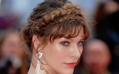 Милла Йовович устроила фотосессию новорожденной дочери