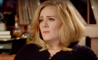 После развода Адель пообещала не петь об экс-муже