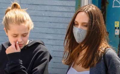 «Передумала быть мальчиком»: дочь Джоли впервые вышла в свет в платье