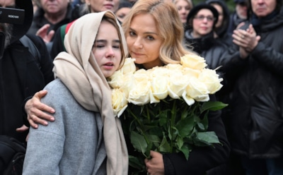 Вдова Левкина объяснила, почему улыбалась на его похоронах