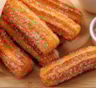 Лакомство родом из Испании за 30 минут: как приготовить чуррос — простое и быстрое угощение