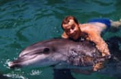 Георгий Делиев с дельфином