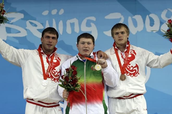 Дмитрий Клоков на подиуме Олимпийских игр
