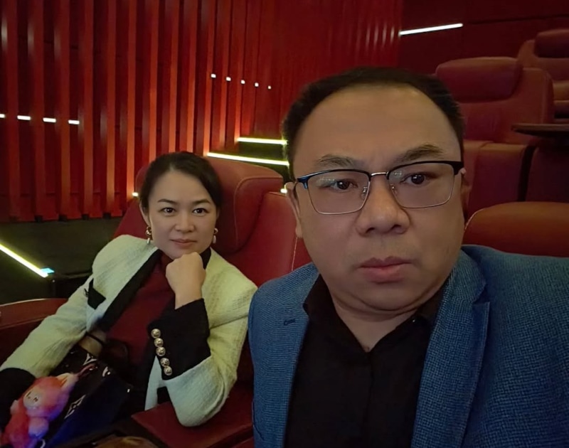 Ван Сяожань с женой